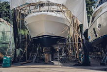 Motor Yacht Moored For Repairs And Service In Dry Dock