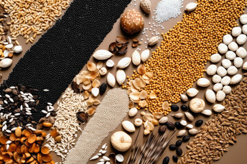Wall Mural - Assorted different types of beans and cereals grains. Set of indispensable sources of protein for a healthy lifestyle. Close-up. View from above.