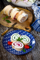 Wall Mural - Slices of homemade sweet roll with fruit jam.