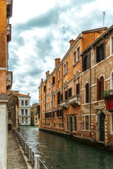 Canvas Print - Houses in narrow canals within the city of Venice.