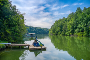 Wall Mural - Secluded lake cove with fishing and swimming piers, with a slide and pontoon boat dock on beautiful Tims Ford Lake in Winchester Tennessee