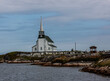 White wooden Church on a bay in Newfoundland