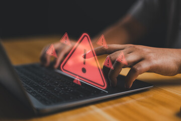 Poster - User is using computer with triangle caution warning sign for notification error and maintenance concept. Hacker attacks and hacking data, cyber crime, Ransomware, Phishing, Spyware, cybersecurity.