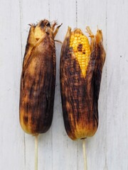 Corn grill food bbq favors on white background 