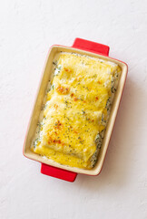 Wall Mural - Italian cannelloni with cheese and spinach. Italian food. Vegetarian food.