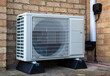 Single Heat Pump outside of a modern house for air conditioning
