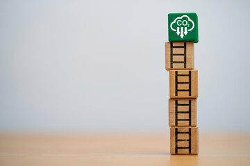 Wall Mural - White reduction carbon emission symbol on the top of wooden block cube with staircase for carbon footprint and carbon credit to limit global warming from climate change by Circular Green Economy.