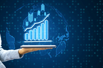 Poster - Close up of female hand holding smartphone with glowing business chart with globe hologram on blurry background. Financial plan graph.