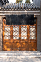 Wall Mural - chinese traditional style wooden door and brick stone wall