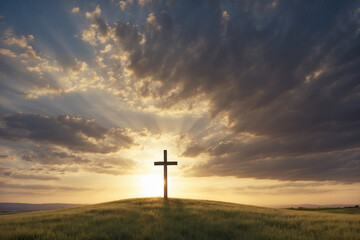 Holy Christian cross on the top of a hill at sunset and dawn in the rays of the sun. Easter Sunday concept.