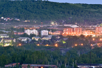 Wall Mural - View of the city in the evening. Urban landscape.