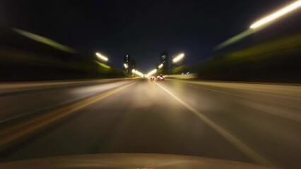 Poster - driving on city road at night