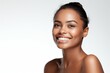 © Werckmeister - Beauty portrait of african american girl with clean healthy skin on beige background. Smiling dreamy beautiful black woman. Curly hair in afro style