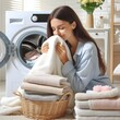 Caucasian lady smelling clean linen from washing  machine in clean bright room