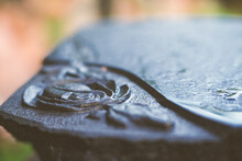 Close Up Of Hand Made Carved Rose Flower In Black Granite Gravestone