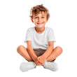 © Yana - Small boy sitting crossed legged smiling isolated on transparent background. AI generated. PNG