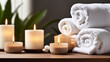 © DJSPIDA FOTO - Create an inviting elegance with soft lighting, emphasizing the elegance of towels and beauty treatments, Towel with herbal bag and beauty treatments, candles, essential oils