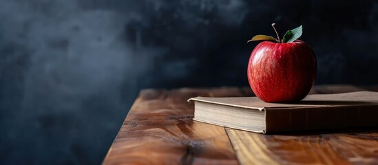 Aufkleber - Open book and red apple on desk with empty chalkboard. Creative Banner. Copyspace image