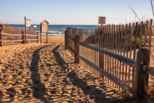 Sand Fencing At The Entrance To A Beach At The Cape Cod National Seashore, There Is A Sign To Keep Off The Dunes