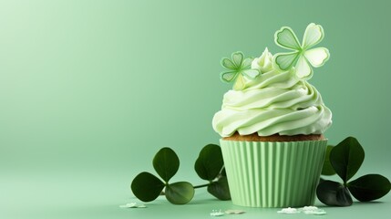 Sticker -  a cupcake with white frosting and green leaves on a green background with a shamrock on top of it.