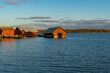 Old traditional boathouses in a village in the archipelago in Finland