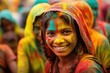 © AdriFerrer - Young girl smiles brightly during the colorful Holi festival