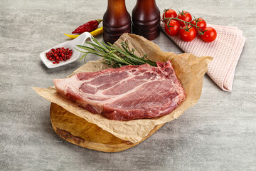 Raw pork neck steak uncoocked