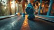 Close-up of a man's feet in motion, running on a treadmill at the gym, dedicated to achieving his fitness goals