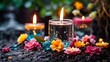 colorful flowers and candles with water drop