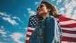 © mariiaplo - A slim, beautiful woman proudly holding the USA flag, radiating grace and love for her country.