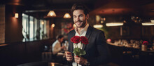 Handsome Elegant Man Holding Red Roses And Smiling In Restuarant, Valentine Concept