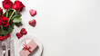 Top view of Valentines day dinner with romantic table place setting and red roses, copyspace