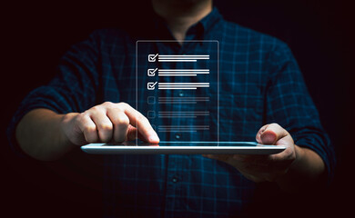Fototapete - Businessman hand touching to tablet with document icon to tick mark for check and approve document , Quality assurance and ISO concept.