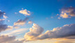 Blue sky background with clouds at sunset