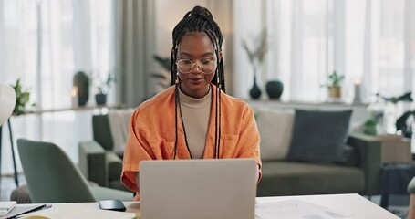 Black woman, typing in home office and laptop for remote work, social media or blog research in apartment. Freelance girl at desk with computer writing email, website post and online chat in house.