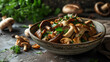 A dish of fresh mushrooms with parsley. 