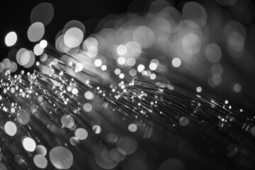 Poster - A captivating black and white photo capturing a bunch of lights. Versatile and suitable for various creative projects