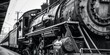 A classic black and white photo of a train. Perfect for vintage or transportation-themed designs