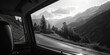 A scenic view of mountains seen through a car window. Ideal for travel and adventure themes