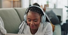 Home, Smile And Black Woman On A Couch, Headphones And Streaming Music In A Living Room. African Person, Apartment Or Girl With Headset, Listening To Audio And Sound With Happiness, Laptop Or Song