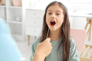 Sticker - Female speech therapist with logopedic probe and little girl in office, closeup