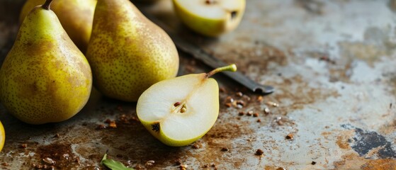 Wall Mural - Ultrawide healthy backdrop of ripe pears on a marbled background, some sliced to show the inside.