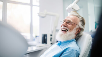 Sticker - Elderly male patient with white hair is smiling and sitting in a dental chair