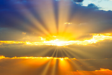 Wall Mural - sunset sky with sunset clouds, sun rays and dramatic sky