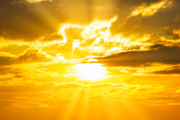 Wall Mural - sunset sky with sunset clouds, sun rays and dramatic sky
