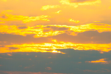 Wall Mural - sunset sky with sunset clouds, sun rays and dramatic sky