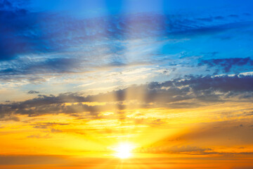 Wall Mural - sunset sky with sunset clouds, sun rays and dramatic sky