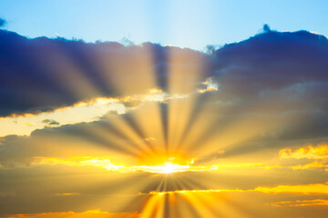 Wall Mural - sunset sky with sunset clouds, sun rays and dramatic sky
