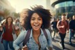 happy african american woman running on the background of a crowd of people