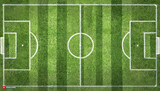 Fototapeta Nowy Jork - Soccer field with green grass and white circles. Top view.